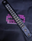 Bracciale ecopelle borchie piramidali due file