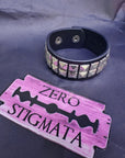 Bracciale ecopelle borchie piramidali due file