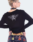 Cardigan con rune, teschi e scarabeo