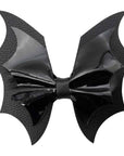 Kreepsville - Fiocco per capelli in PVC nero a forma di ali di pipistrello